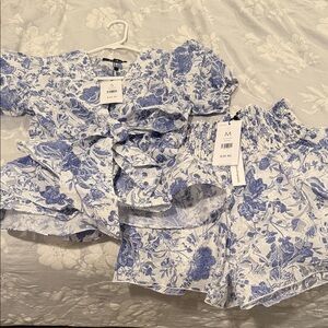 AKIRA Blue and White Floral Wrap Top